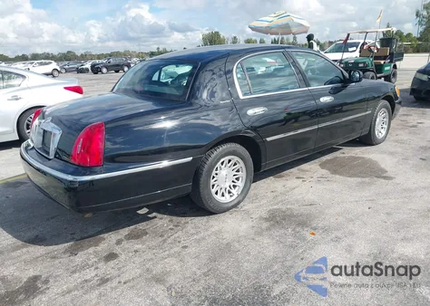 1998 Lincoln Town Car Signature из США, поврежденный, VIN 1LNFM82W4WY732328